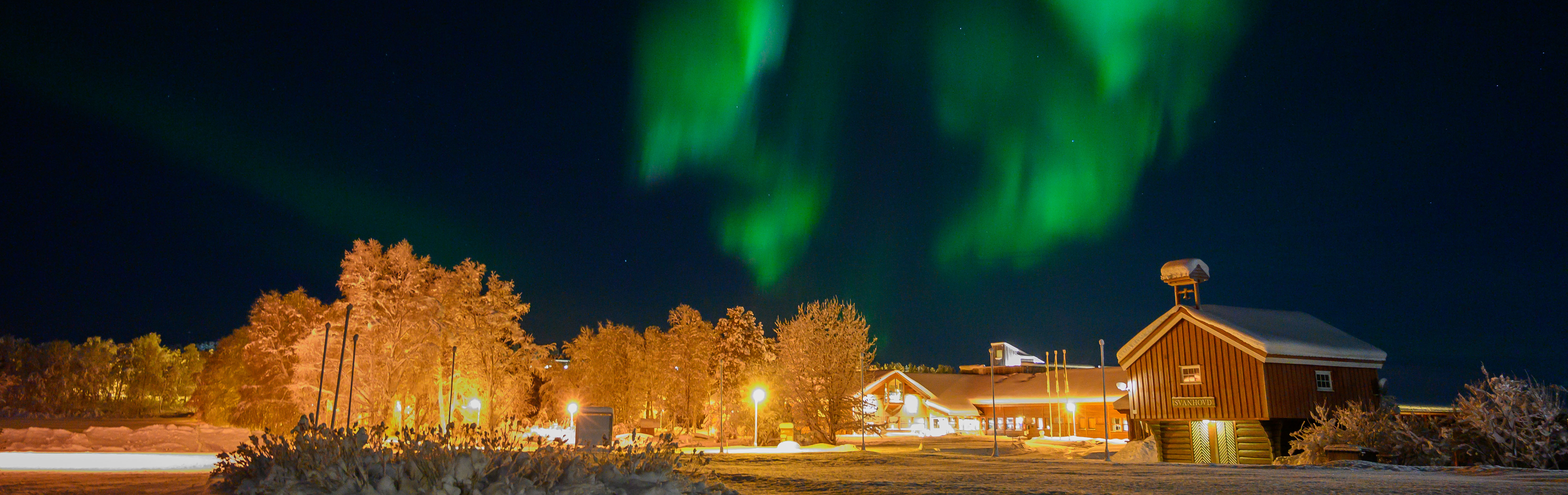 Northern lights dancing above the NIBIO Svahovd Research Station in January 2022